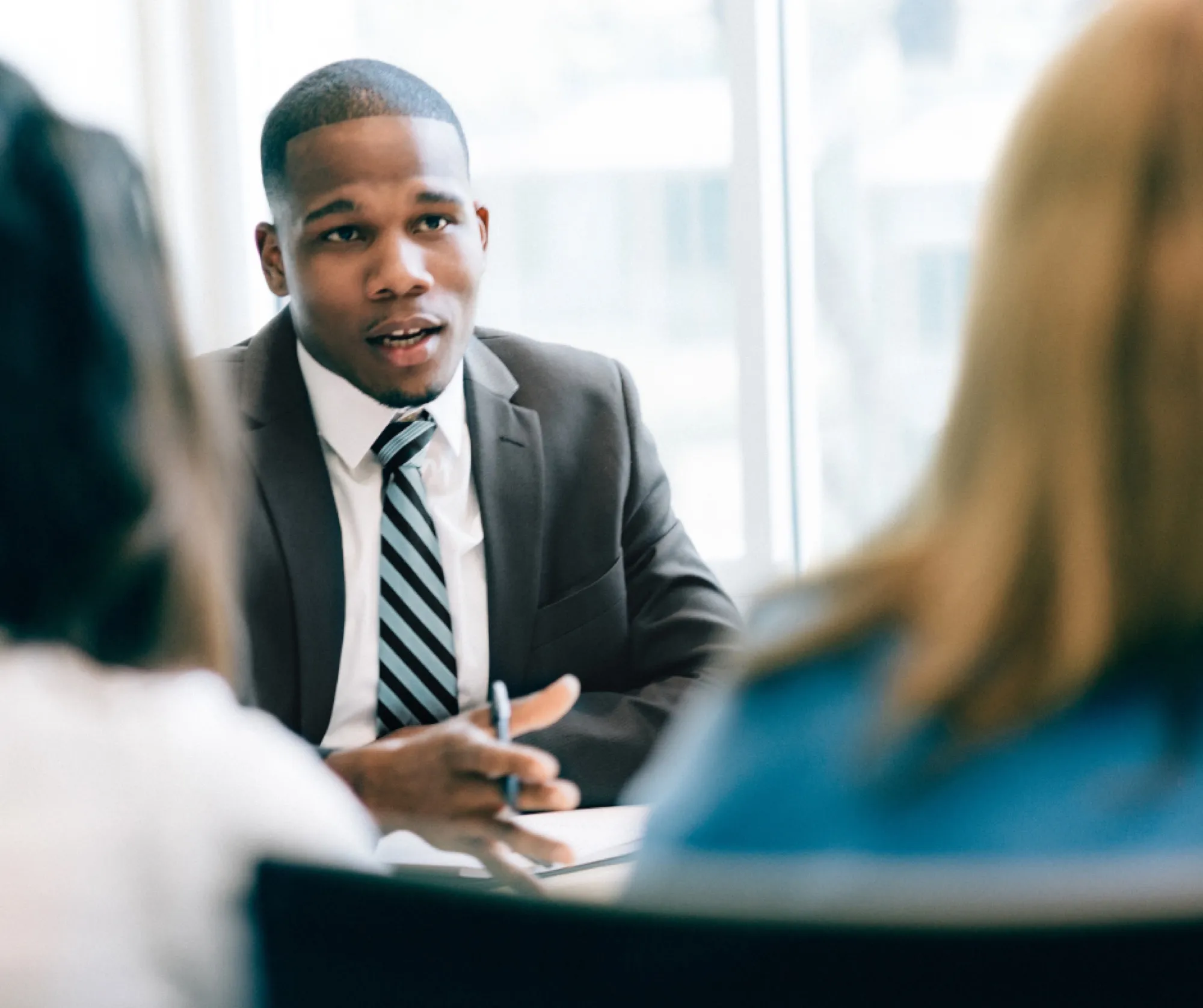 A candidate answering questions in a job interview